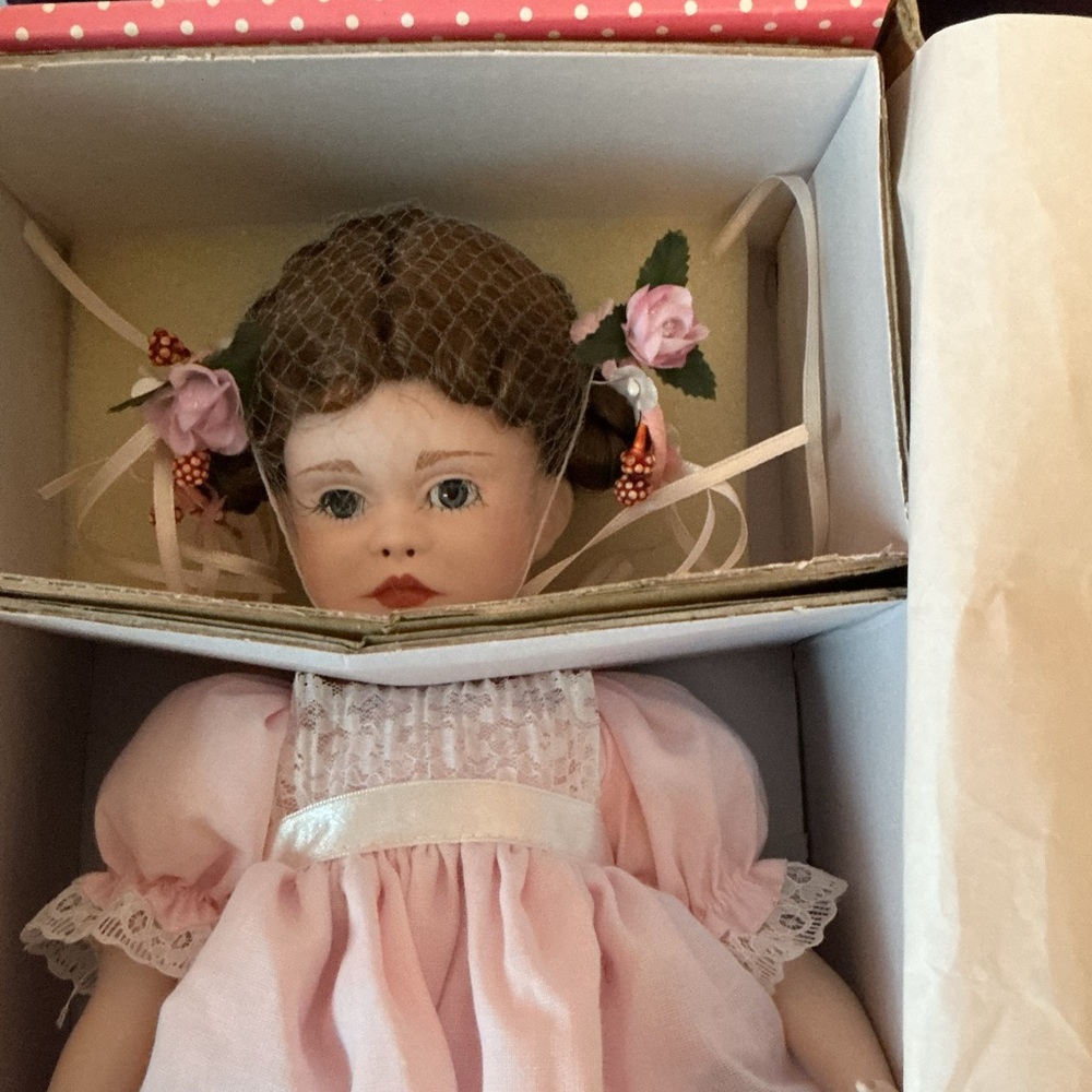 Elegant Pink Doll with Floral Details